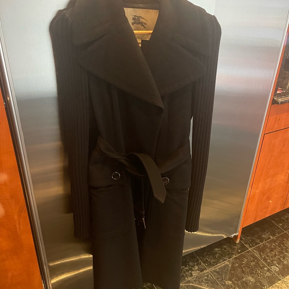 Knee length Burberry belted coat. Item is used. Size M.
